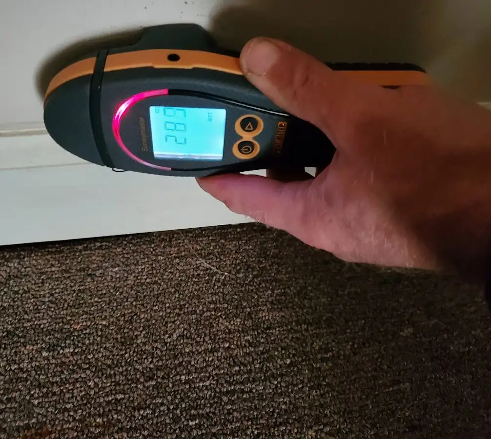 Moisture detection at baseboard during Burst Pipe Cleanup in Mililani Town